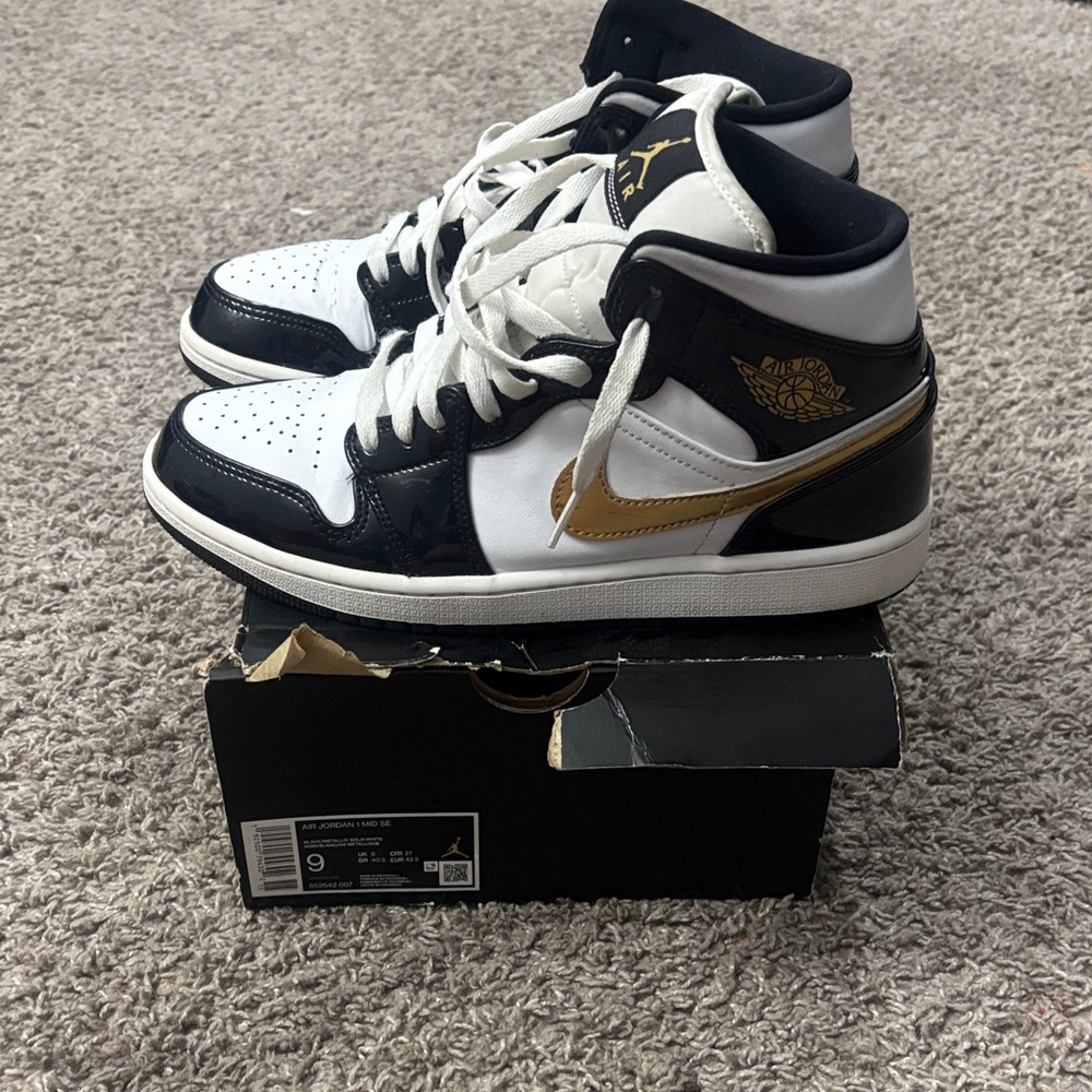 Jordan Air Jordan 1 Mid White Black Gold Sneakers